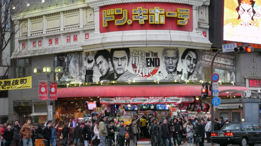 a crowd in front of an asian theater