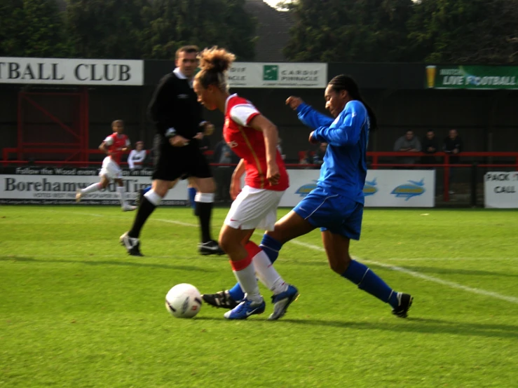 two players trying to get control of the ball