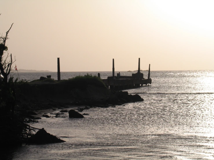 a body of water with power towers on top of it