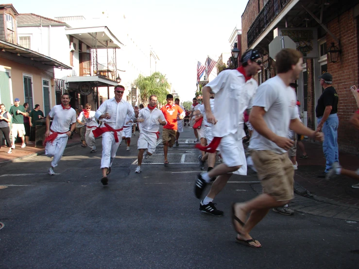 the men are in white and red clothes