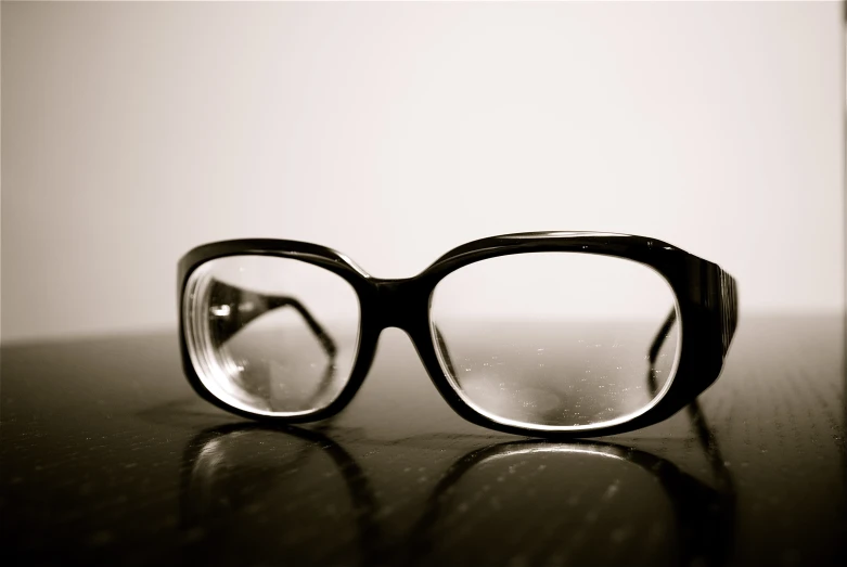 a pair of glasses that are on a table