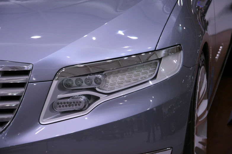 a closeup s of the grille on the front of a car