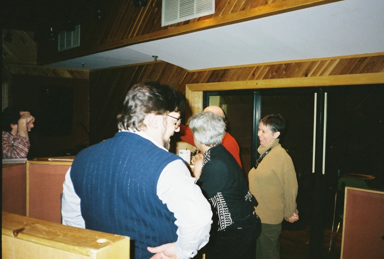 a group of older women standing next to each other