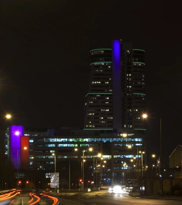 an open area with many lights on in the city