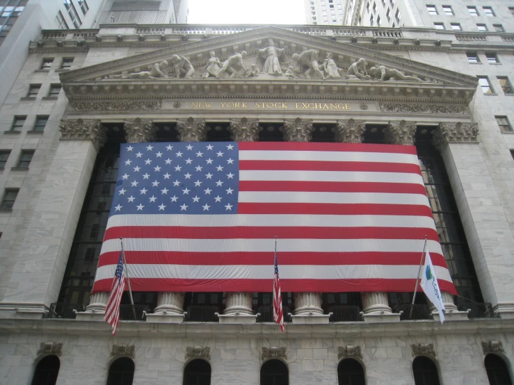 an american flag is hanging on the wall