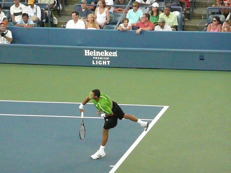 a man with a tennis racket in his hand