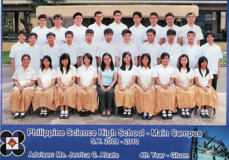 a group picture of an outside school with the numbers 13