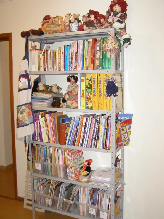 a bookshelf filled with many different books in a home