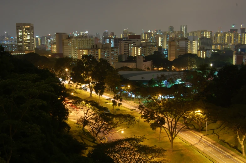 a large city has a street filled with cars