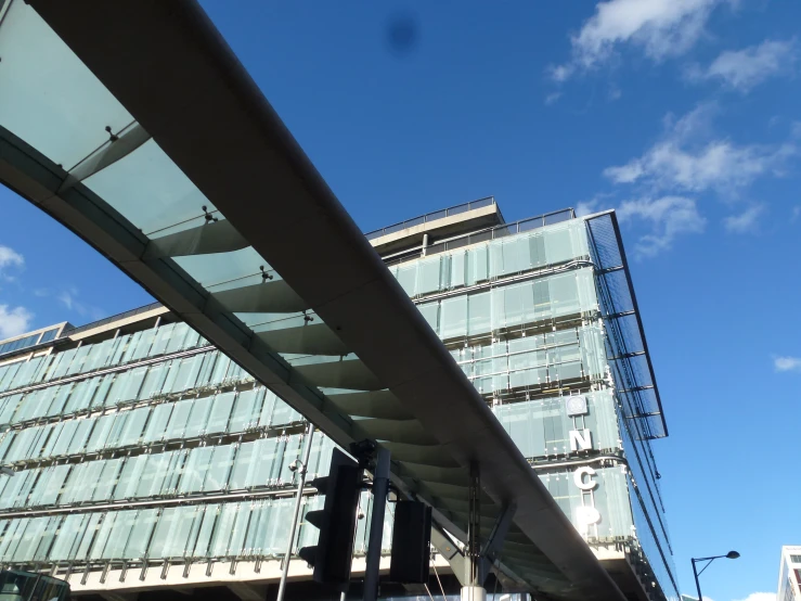 a tall building on the side of a city street