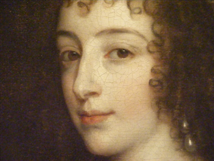 this painting depicts the face of a lady with curly hair