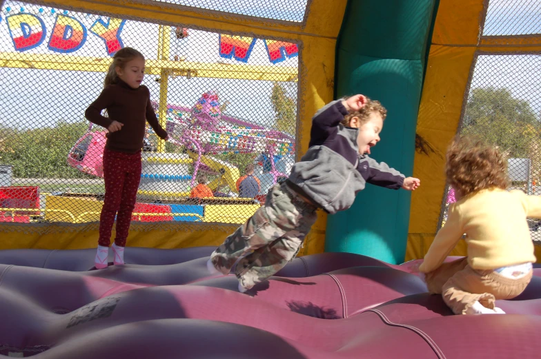 s are playing in an interactive playground