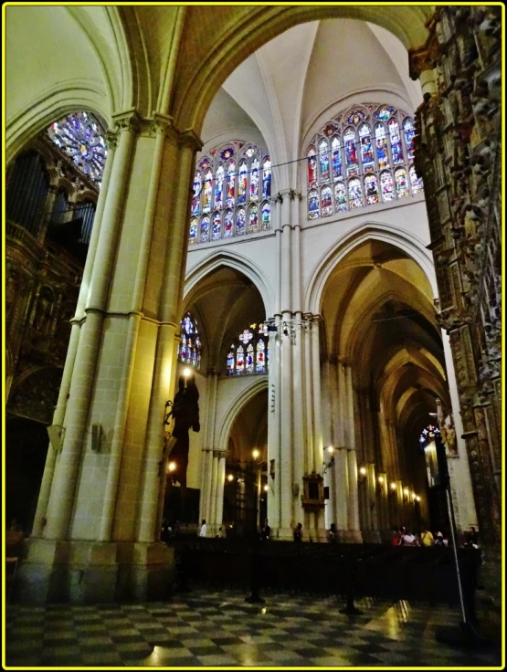 there is an altar and stained glass windows in the building