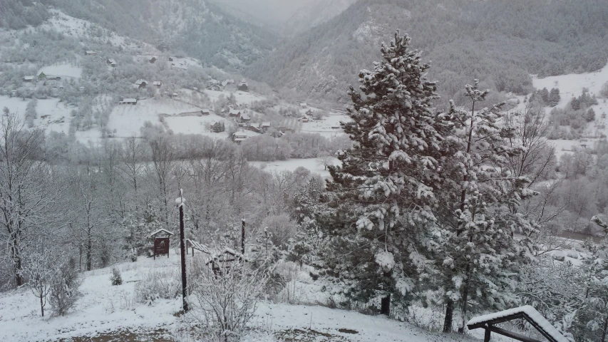 the snow covered mountains are in the distance