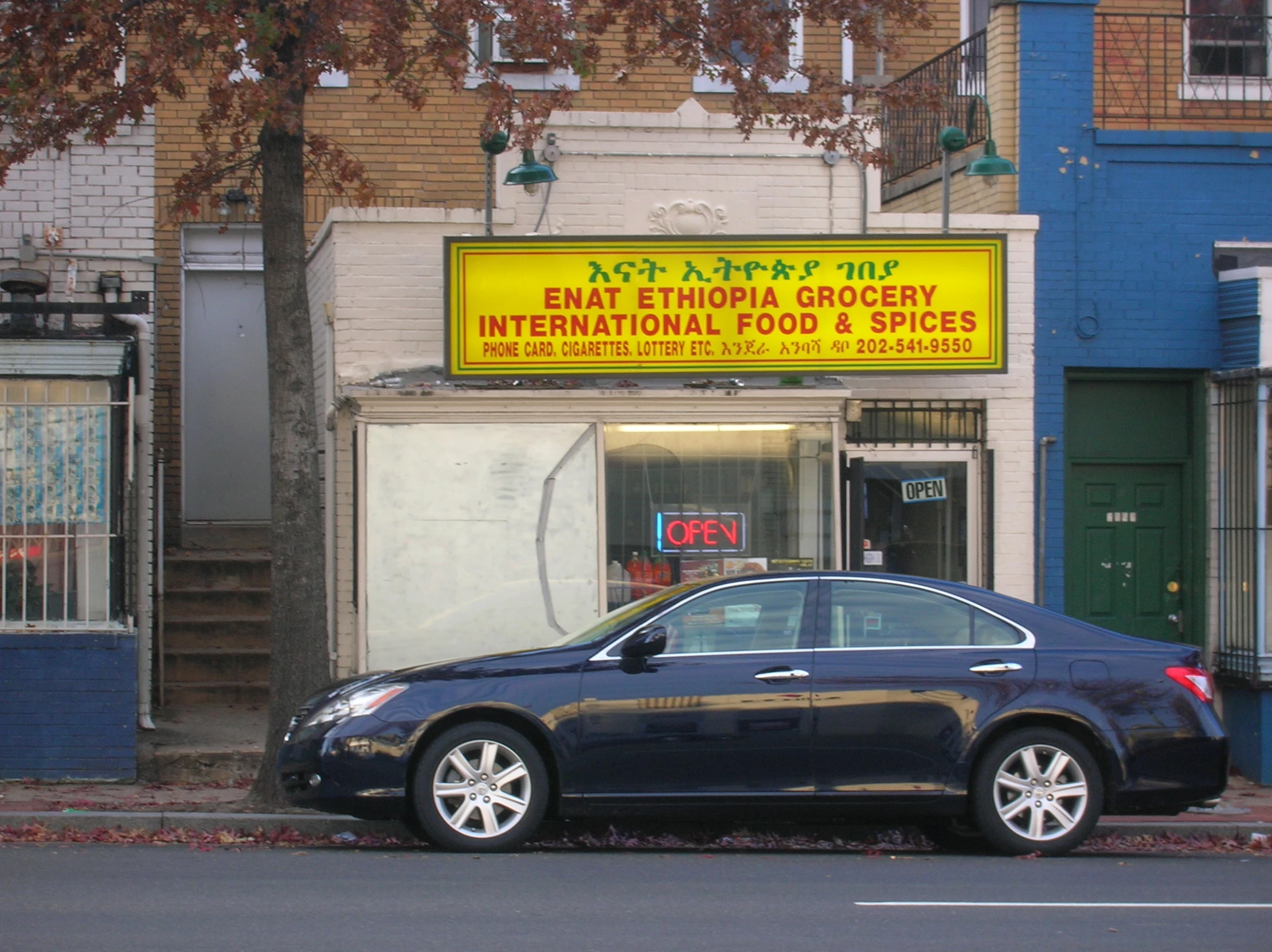 a car is parked next to a street corner