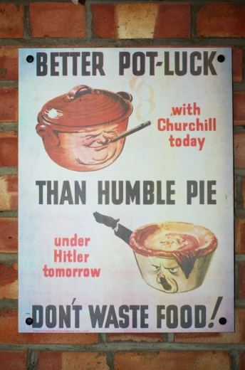 a poster on a brick wall advertising pot luck