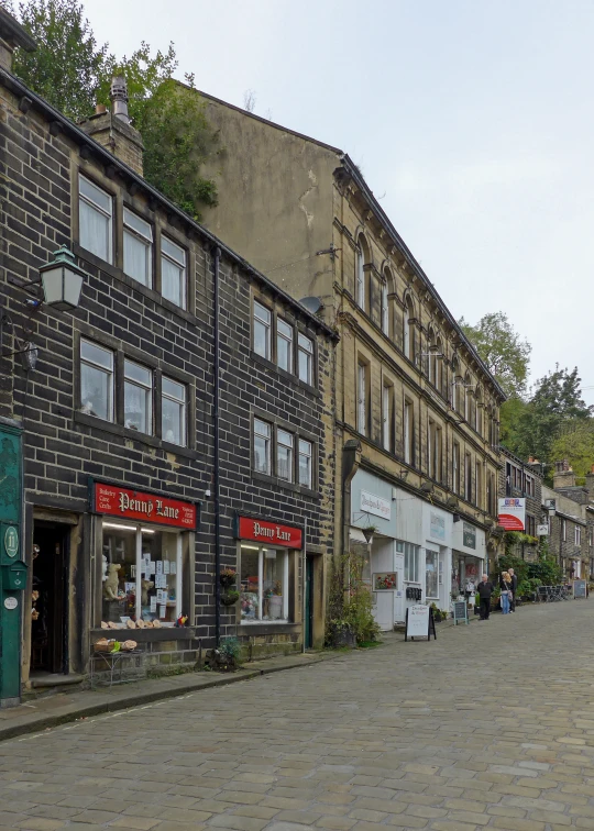 there are several brick buildings on this street