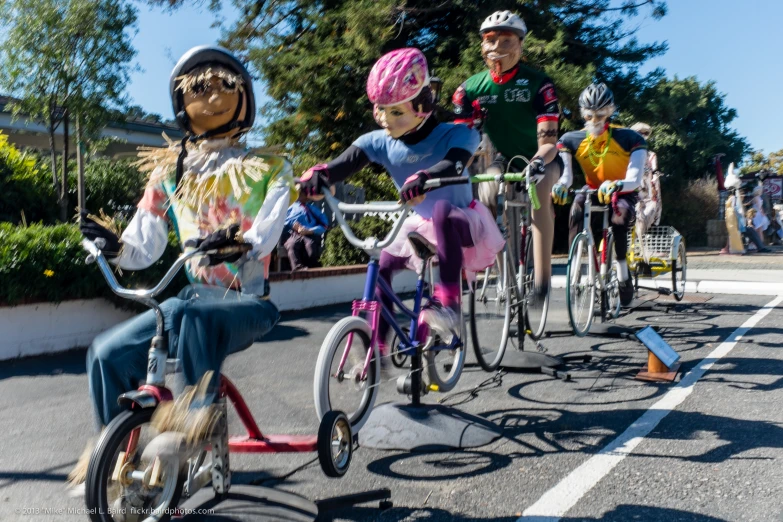 a group of people riding bikes with one person wearing a bike helmet