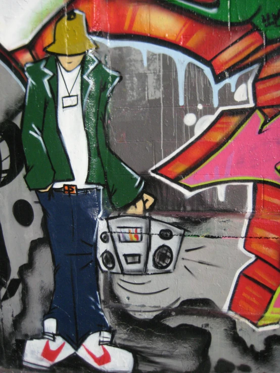 a graffiti wall with a drawing of a woman in green and orange with a car