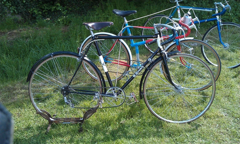 several different color bicycles parked next to each other