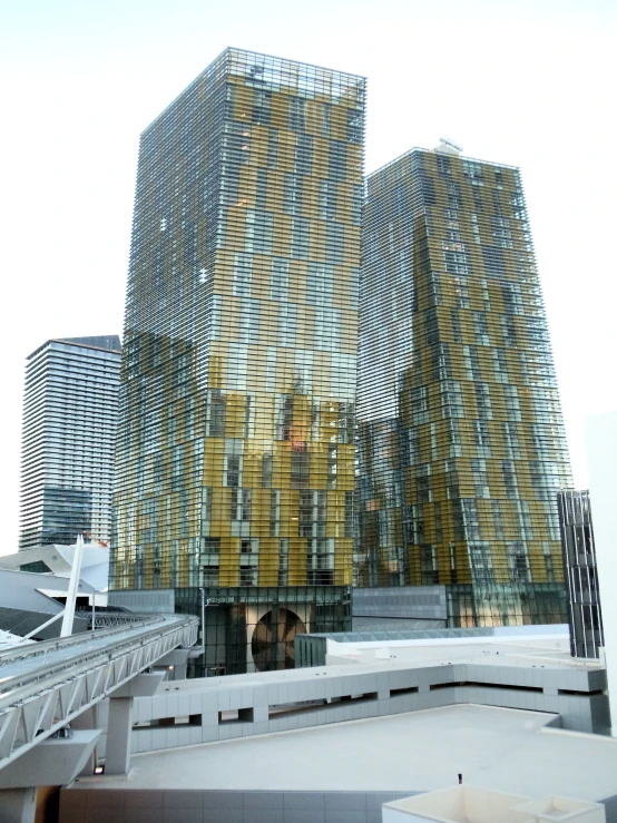 large yellow building with two windows on the second level