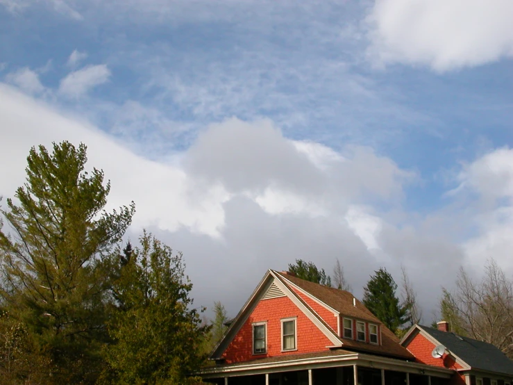 an red house in the midst of the day