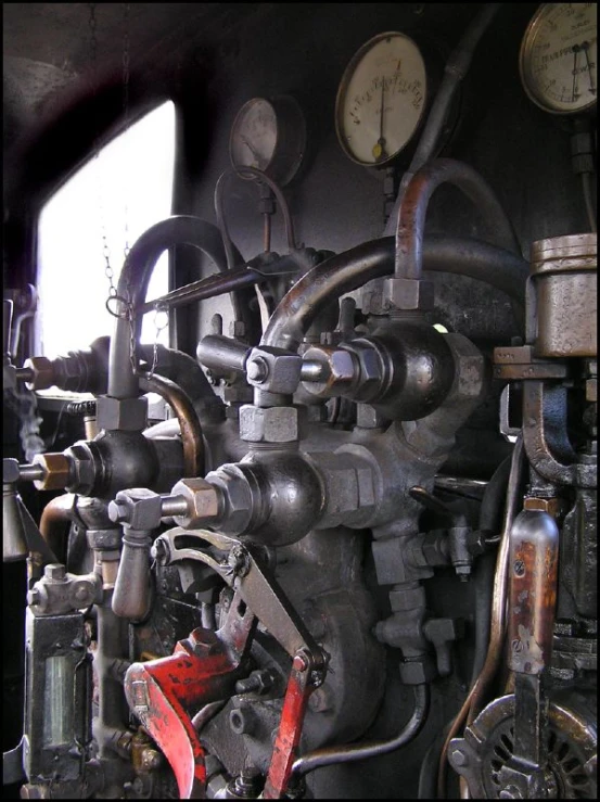 a machine that has different gauges and valves on it