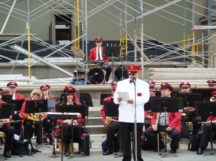 a band and orchestra performing on stage