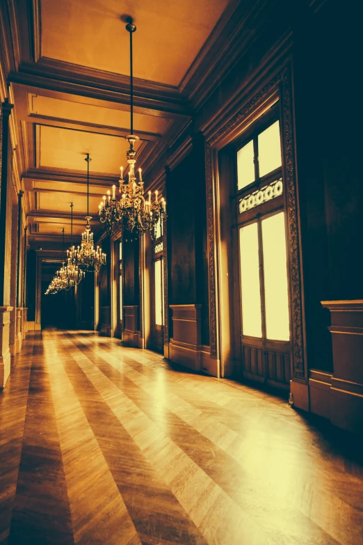 a room with a chandelier and some chandeliers