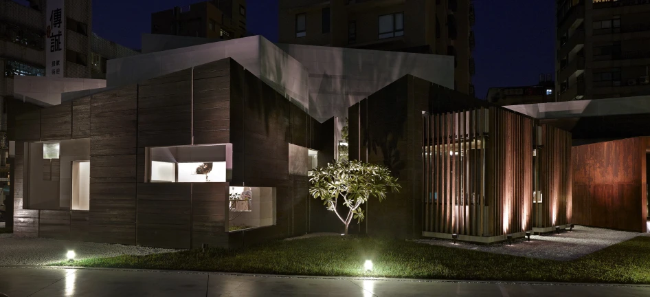 an architectural house at night with no one in it
