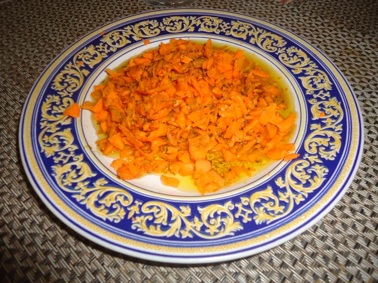 plate of carrots on table with white cloth