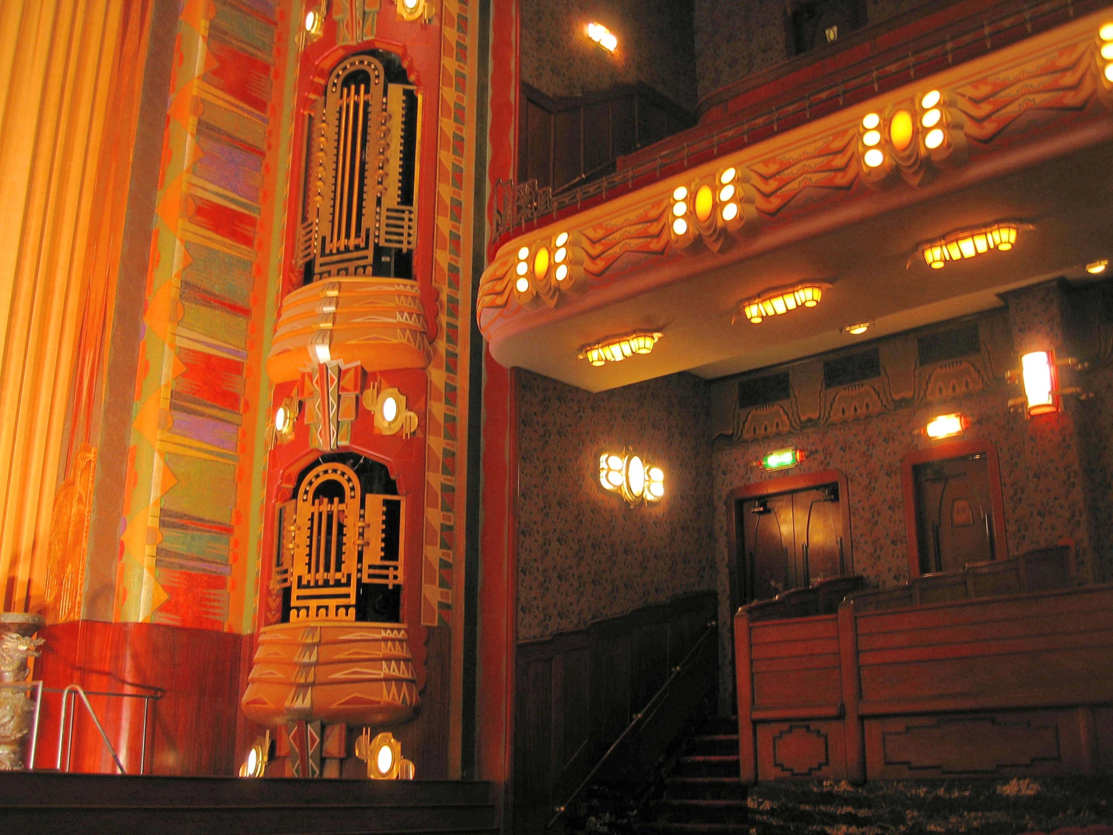 a view of some big fancy lights in a building