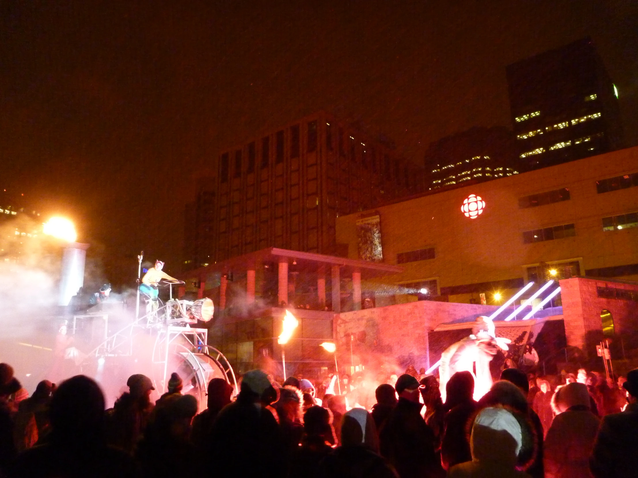 crowds of people at a music concert in the city