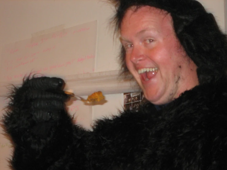 a man is dressed up in an animal suit