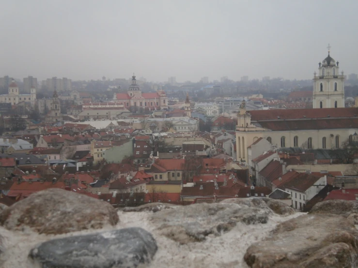 the cityscape is covered in heavy snow