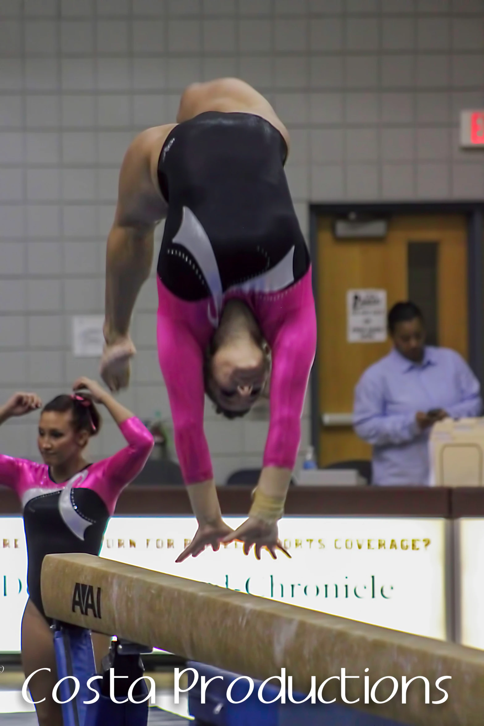 the professional gymnastics player balances on a bar