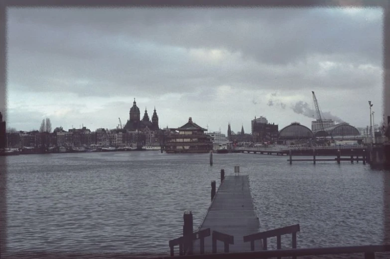 some docks with a city in the background