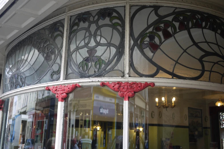 decorative window frame in the center of a building