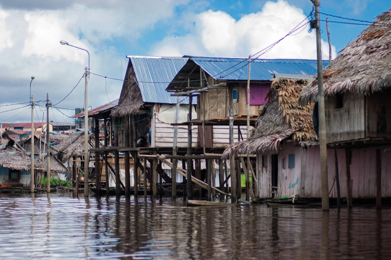 a body of water that is next to houses