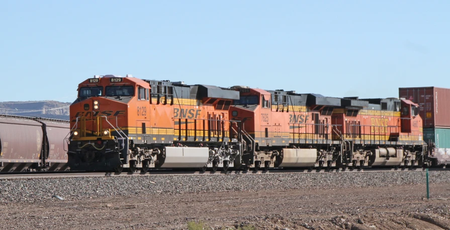 a train that is sitting on the rail road tracks