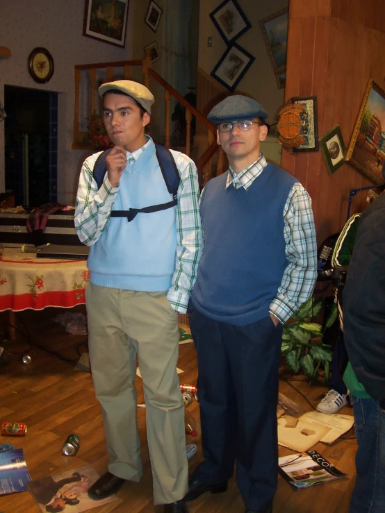 two men dressed as billiards in blue vests