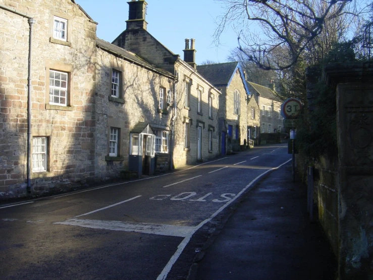 a view down an old brick lined town street