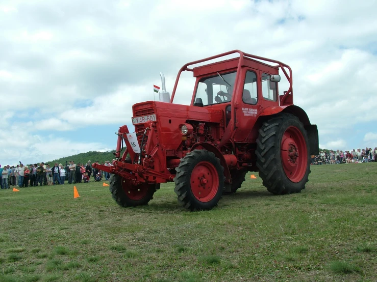 the tractor is in the middle of a field