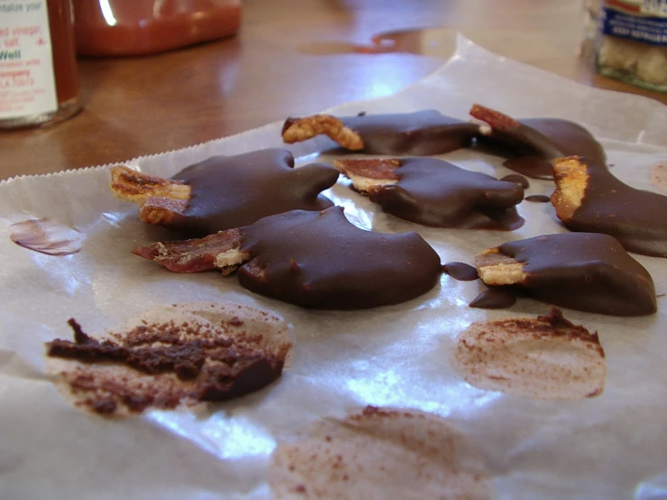 a paper with different flavored chocolates on it