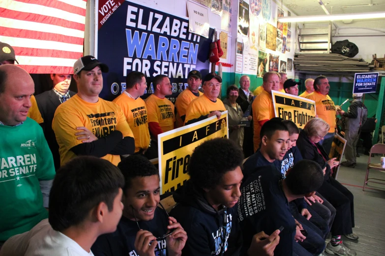 a group of men with signs holding signs