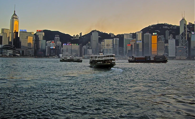 a picture of the skyline of hong kong in the afternoon