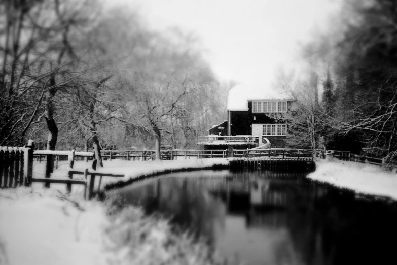 a snowy, snowy view of some house in the distance