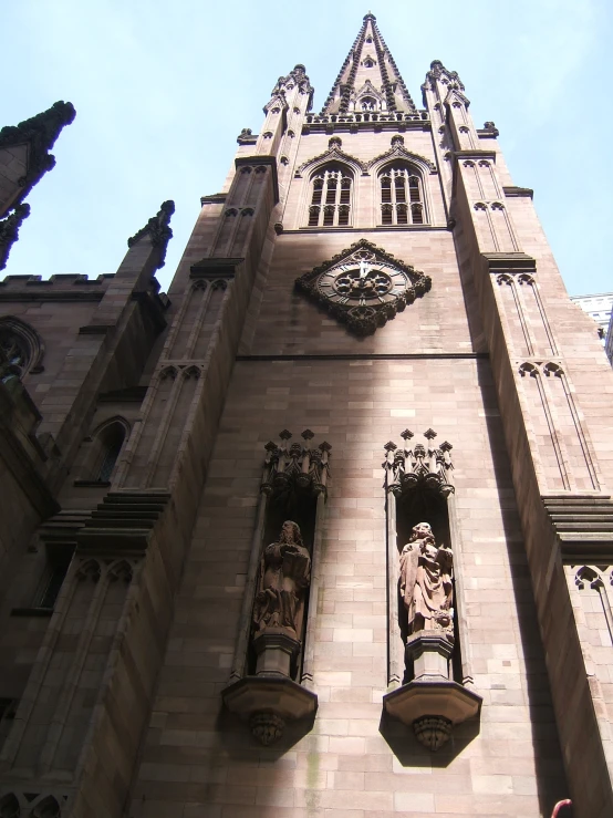 a large building with a clock displayed on the side