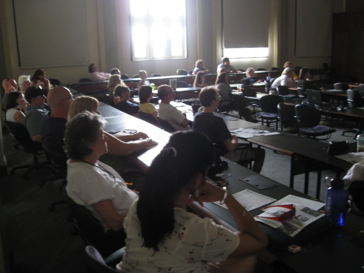 an image of students in classroom setting at desks