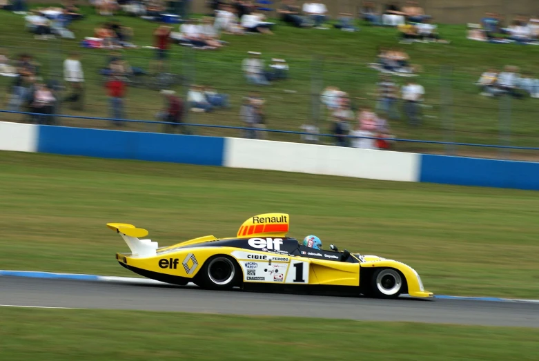 a man is racing in a car during a race